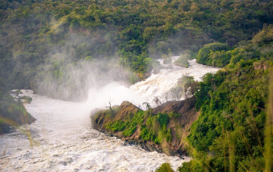 Murchison Falls surrounded by lush green landscapes in Uganda.