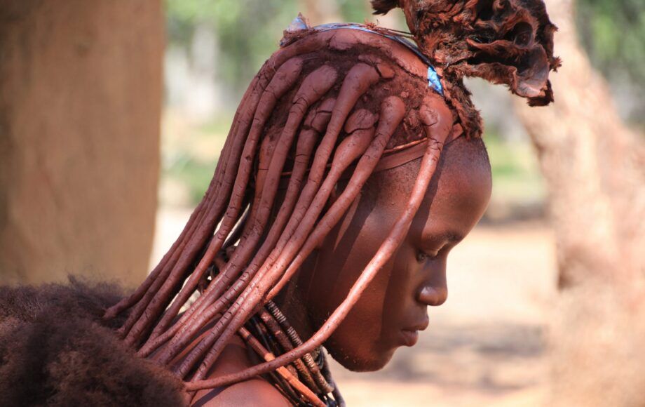 Close-up of a Himba woman with ochre-red hair